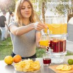 Dobbelt  drikke-dispenser  med  plads  til  is  og  snacks