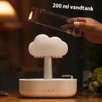 Regnsky diffuser med lys og damp